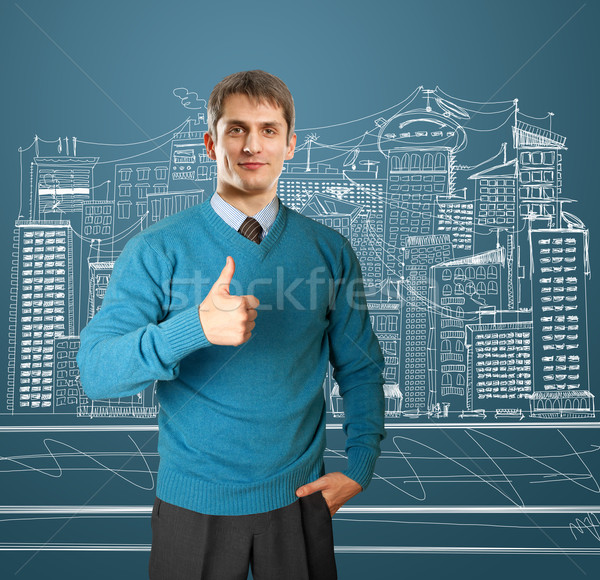 man in blue shows well done Stock photo © leedsn