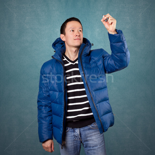 Asian Man in Down Padded Coat Stock photo © leedsn