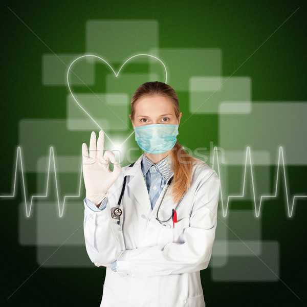 Médico mujer electrocardiograma pantalla táctil negocios médicos Foto stock © leedsn