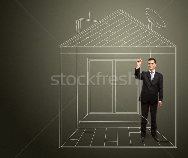 businessman with marker in fictional house Stock photo © leedsn