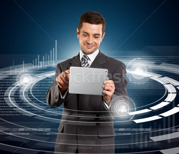 Businessman With Touch Pad Stock photo © leedsn