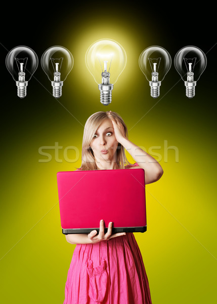 Blond roze jurk laptop lamp verwonderd Stockfoto © leedsn