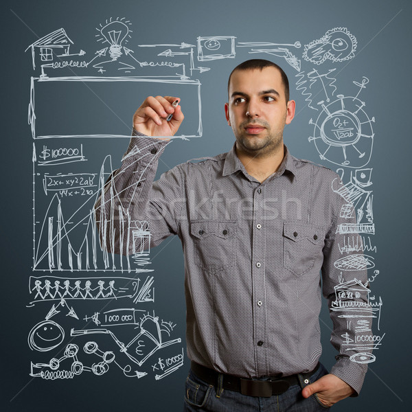 businessman writing something Stock photo © leedsn