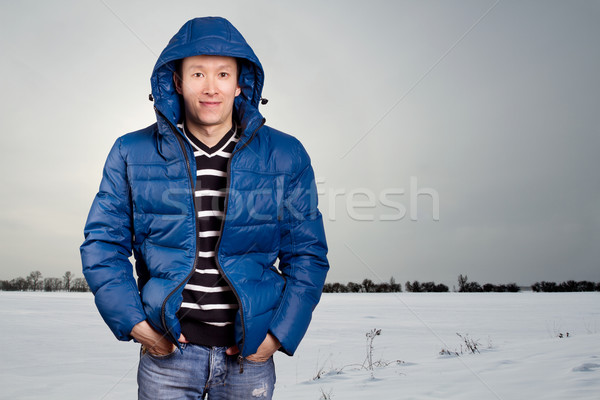 Asian Man in Down Padded Coat Stock photo © leedsn