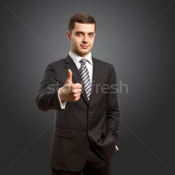 caucasian male shows well done Stock photo © leedsn