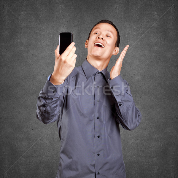 Asian Man Making A Selfie Stock photo © leedsn