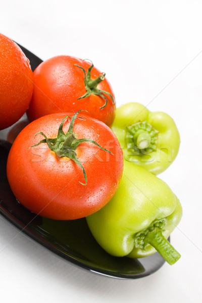 Tomaten Paprika frischen schwarz Keramik Platte Stock foto © Leftleg