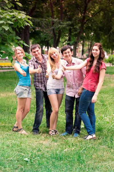 Foto stock: Grupo · feliz · sonriendo · estudiantes · fuera