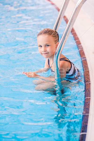 Cute little girl in swimming pool Stock photo © Len44ik