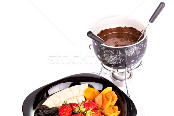 Stock photo: Chocolate fondue with fruits isolated on white