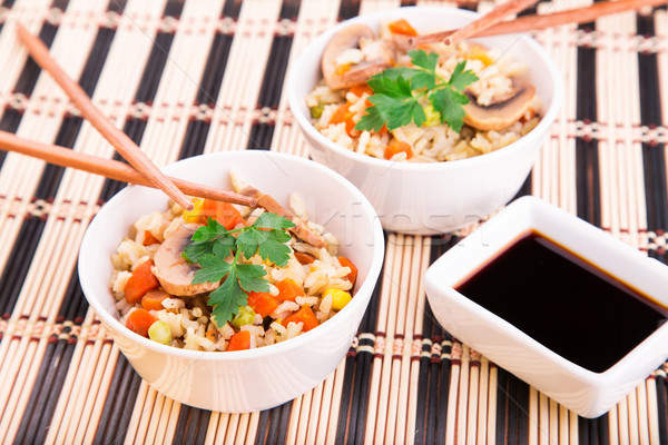 Stock photo: Rice with vegetables and mushrooms with soy sauce