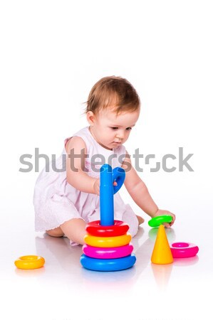 Baby playing with stacking rings Stock photo © Len44ik