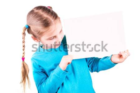 Lächelnd kleines Mädchen halten weiß Karte Probe Stock foto © Len44ik