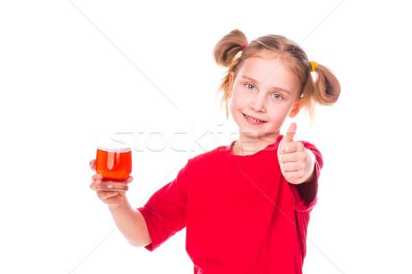 Cute kleines Mädchen halten Glas Saft lächelnd Stock foto © Len44ik