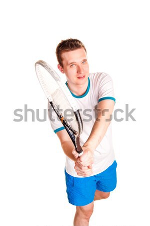 Stock photo: Sportive young man playing tennis