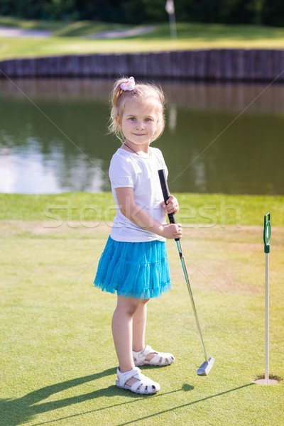 Cute nina jugando golf campo aire libre Foto stock © Len44ik