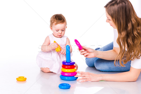 Baby with mother playing with stacking rings Stock photo © Len44ik