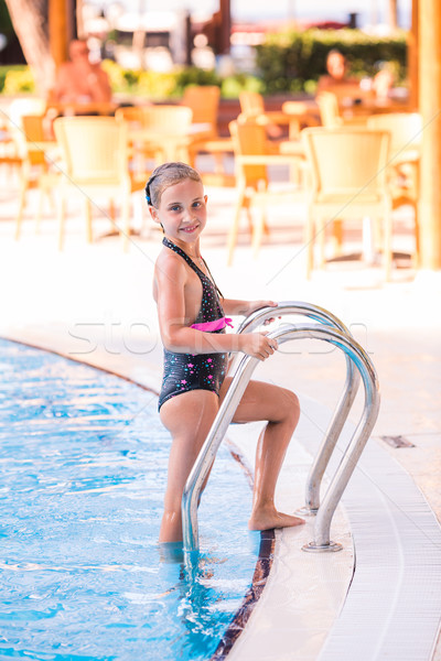 Cute little girl in swimming pool Stock photo © Len44ik