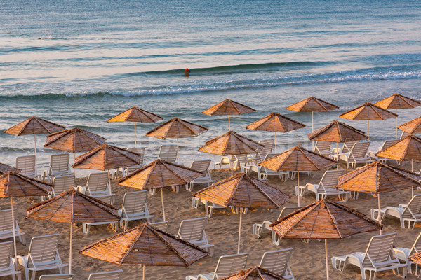 Beautiful view of a resort beach with sunshades Stock photo © Len44ik