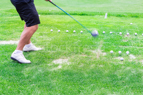 Low section of golf player ready to hit the ball Stock photo © Len44ik