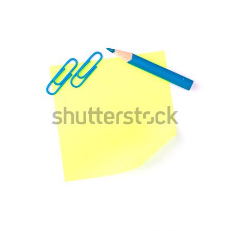 Neon yellow paper note with blue clips and blue pencil Stock photo © Len44ik