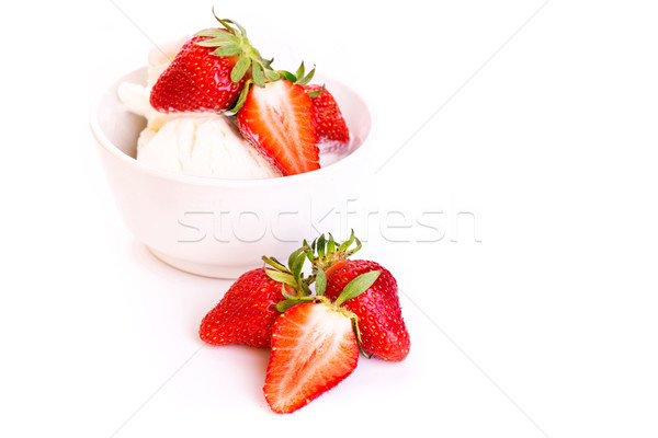 Fresh ice cream in a plate with strawberry isolated on white Stock photo © Len44ik