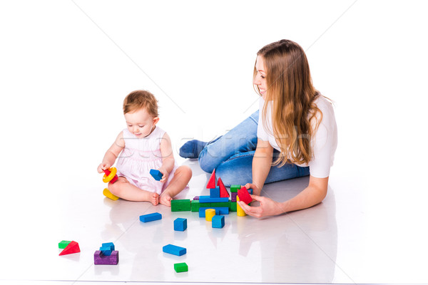 Beautiful baby with mother building with cubes Stock photo © Len44ik