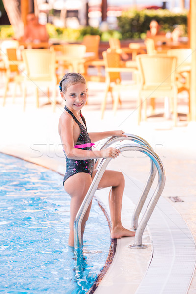 Cute little girl in swimming pool Stock photo © Len44ik