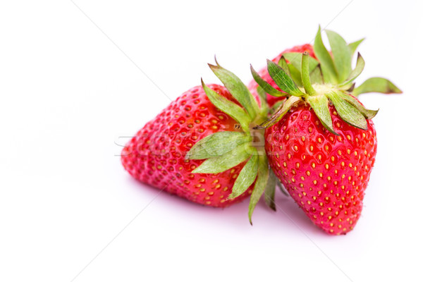 Fresh strawberries isolated on white background. Stock photo © Len44ik