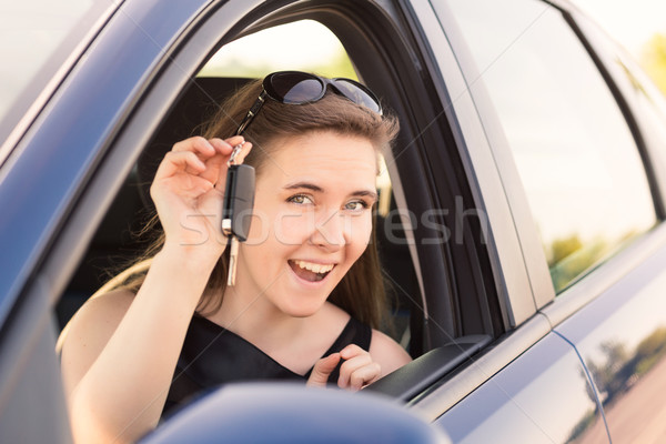 Stock photo: Beautiful businesswoman driving in the car