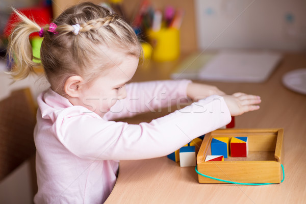 Stock fotó: Aranyos · kislány · játszik · kockák · asztal · baba