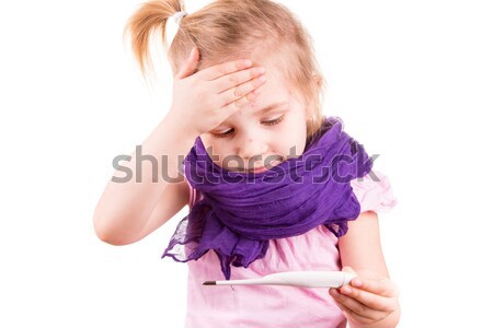 Sick little girl measuring temperature and checking her forhead Stock photo © Len44ik