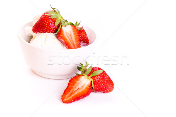 Fresh ice cream in a plate with strawberry isolated on white Stock photo © Len44ik