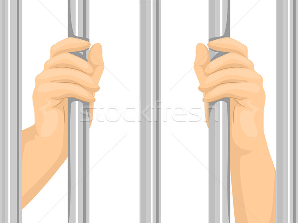 Hands Behind Bars Stock photo © lenm