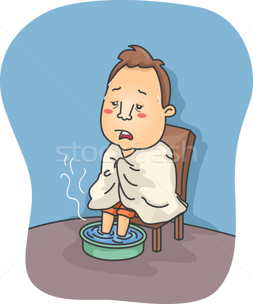 Man with Flu Soaking Feet in Hot Water Stock photo © lenm