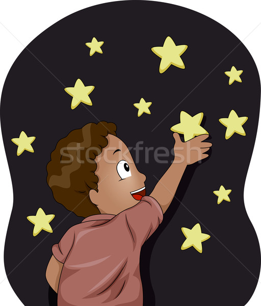 Kid Boy with Glow-in-the-Dark Stars Stock photo © lenm