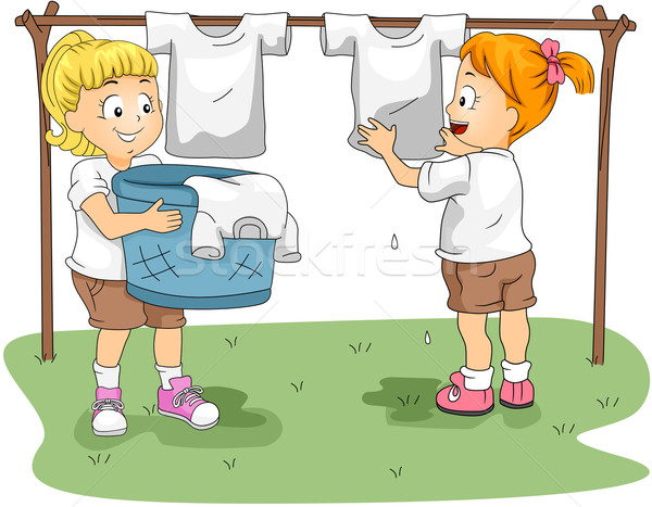 Stock photo: Kids Hanging Clothes