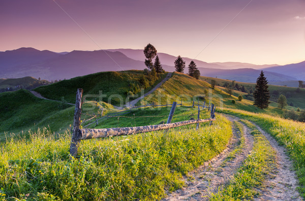Montanhas paisagem pôr do sol dramático céu Foto stock © Leonidtit