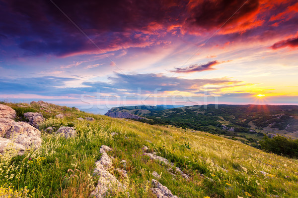 Pôr do sol montanhas paisagem dramático céu Foto stock © Leonidtit