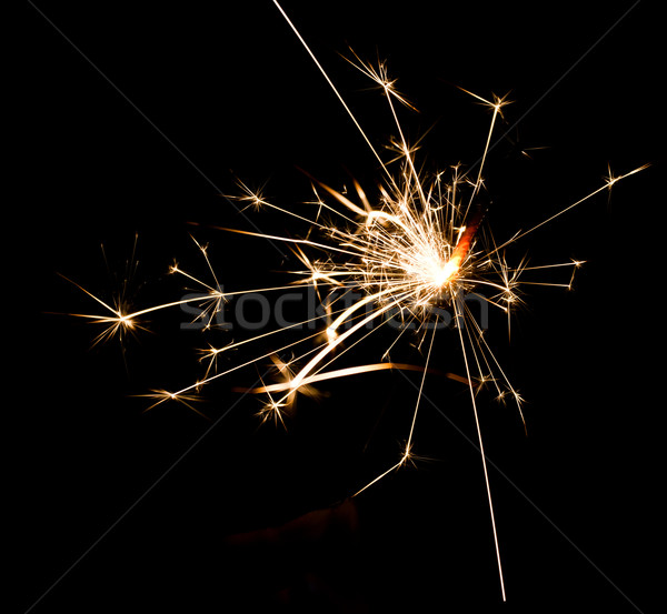Szikra karácsony csillagszóró tűzijáték láng fekete Stock fotó © Leonidtit