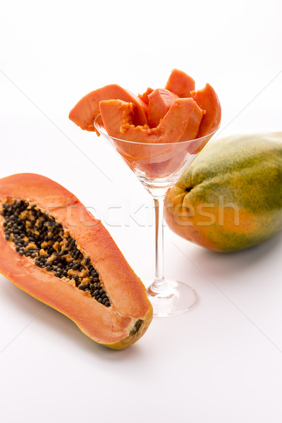 Tangerine pulp and peppery seeds - the Papaya
 Stock photo © leowolfert