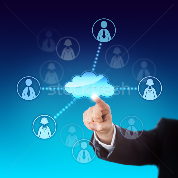 Contacting Office Workers Via The Cloud Stock photo © leowolfert