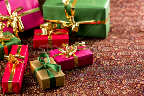 Seven Small Gifts on a Festive Blanket
 Stock photo © leowolfert