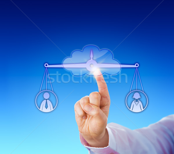 Assessing A Female And A Male Worker In The Cloud Stock photo © leowolfert