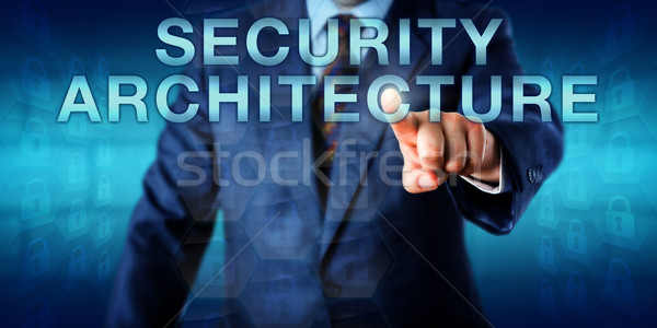 Consultant Pushing SECURITY ARCHITECTURE Onscreen Stock photo © leowolfert