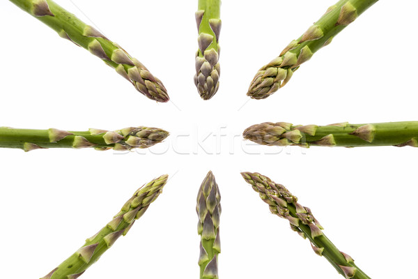 Stock photo: Eight Asparagus Spears Pointing at the Middle