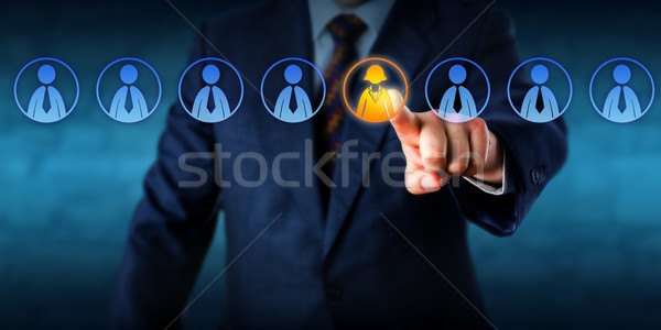 Recruiter Selecting The Only Female Candidate Stock photo © leowolfert