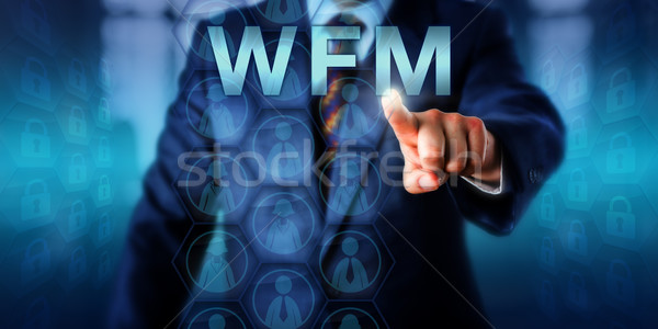 Manager Touching WFM Onscreen Stock photo © leowolfert