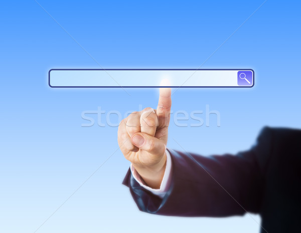 Arm In Suit Touching A Blank Search Engine Tool Stock photo © leowolfert