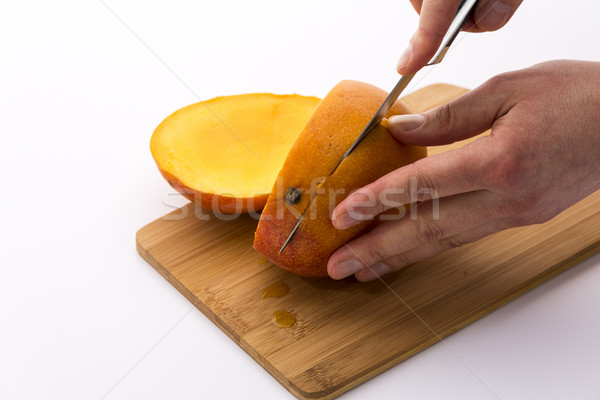 Zweiten geschnitten saftig Mango zwei Stock foto © leowolfert